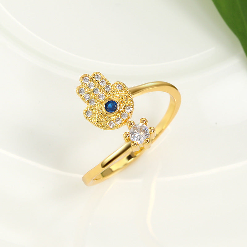 Evil Eye Protection Ring in gold-tone with blue center stone and pave clear stones