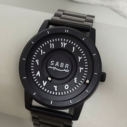 Sabr Watch, black stainless steel Islamic watch with metal bracelet.